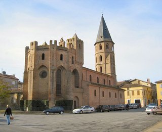 The historic fortified church of L’Isle-en-Dodon stands at the village center, showcasing medieval architecture and local heritage in Occitanie. The historic fortified church of L’Isle-en-Dodon stands at the village center, showcasing medieval architecture and local heritage in Occitanie.
