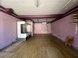 Interior of a former village shop requiring renovation in rural France Interior of a former village shop requiring renovation in rural France